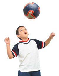 boy-playing-soccer